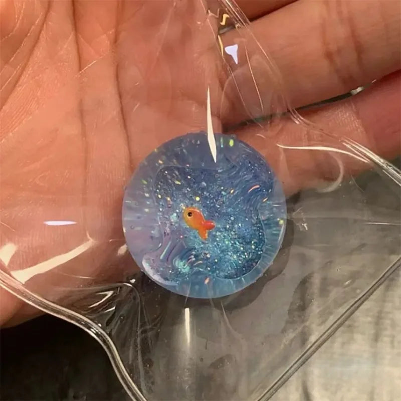 Ocean Planet Squishy Fidget Toy Soft Cute Little goldfish Pinch Decompression Toy Planet Sequin Anti-Anxiety toy for Kids Gifts