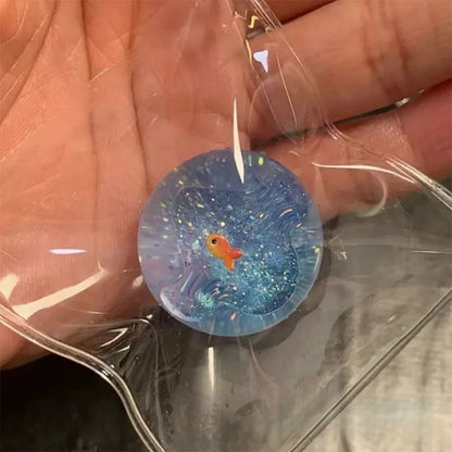 Ocean Planet Squishy Fidget Toy Soft Cute Little goldfish Pinch Decompression Toy Planet Sequin Anti-Anxiety toy for Kids Gifts