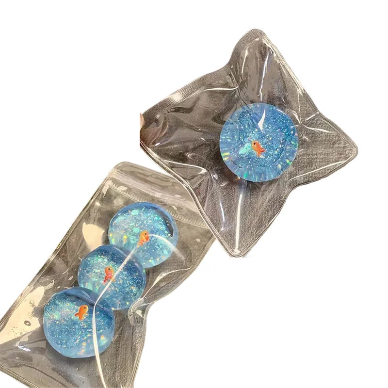 Ocean Planet Squishy Fidget Toy Soft Cute Little goldfish Pinch Decompression Toy Planet Sequin Anti-Anxiety toy for Kids Gifts